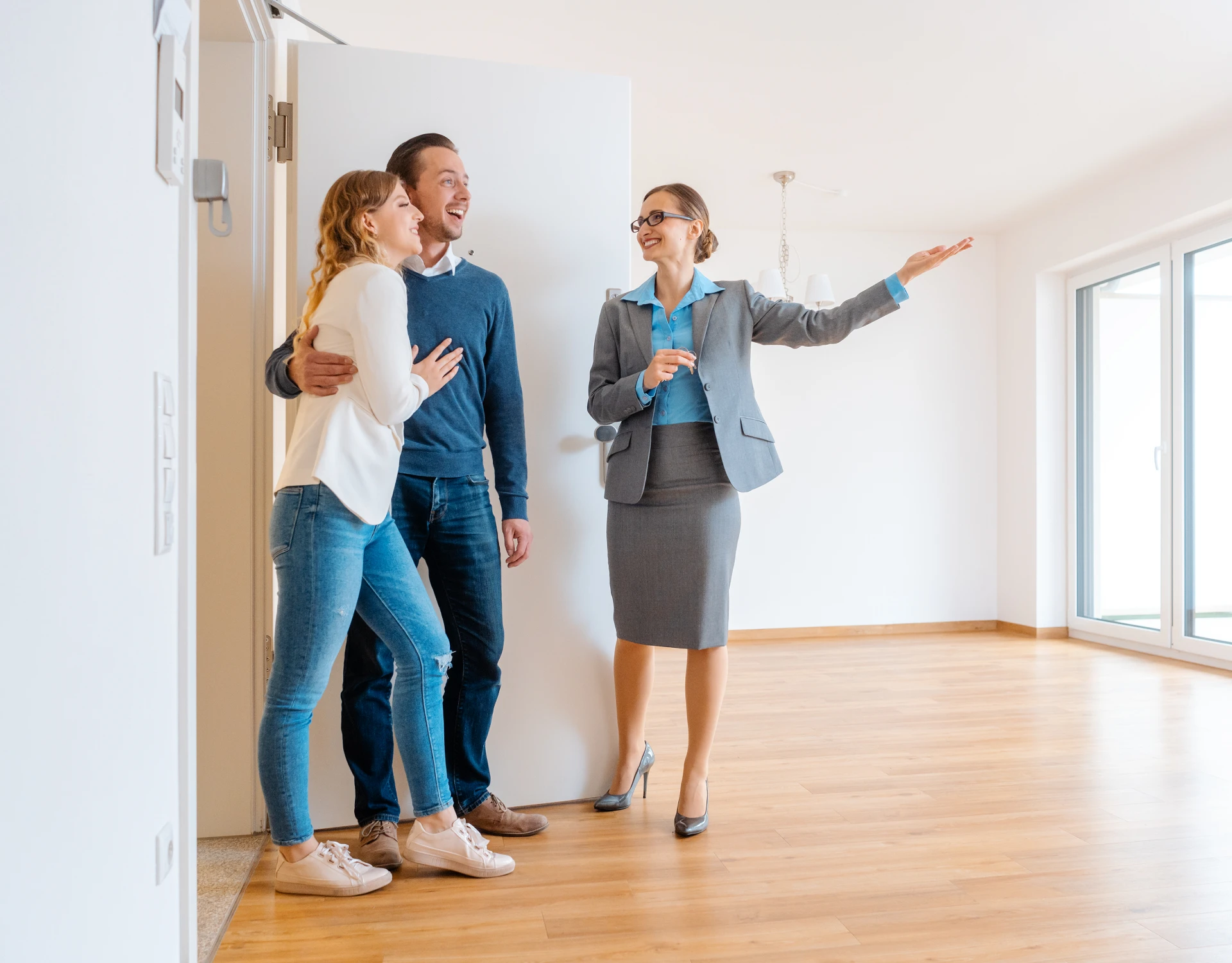 Real estate agent showing empty apartment