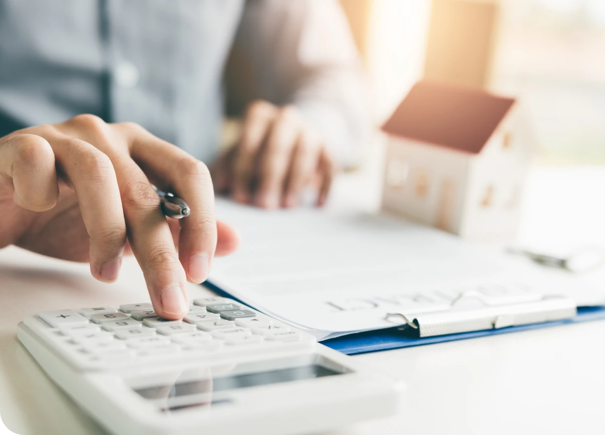 Calculating finances with clipboard and calculator